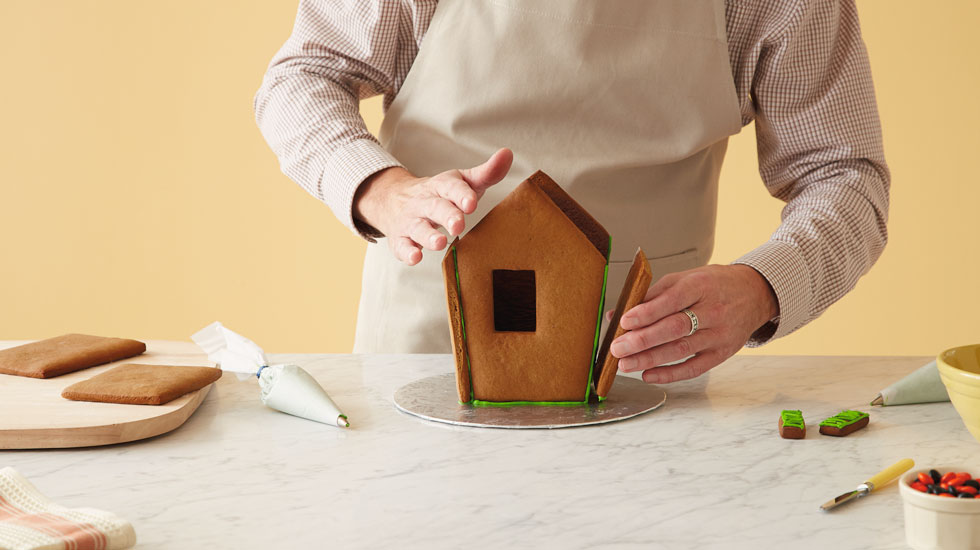How to make a Halloween gingerbread house: add remaining side and back piece