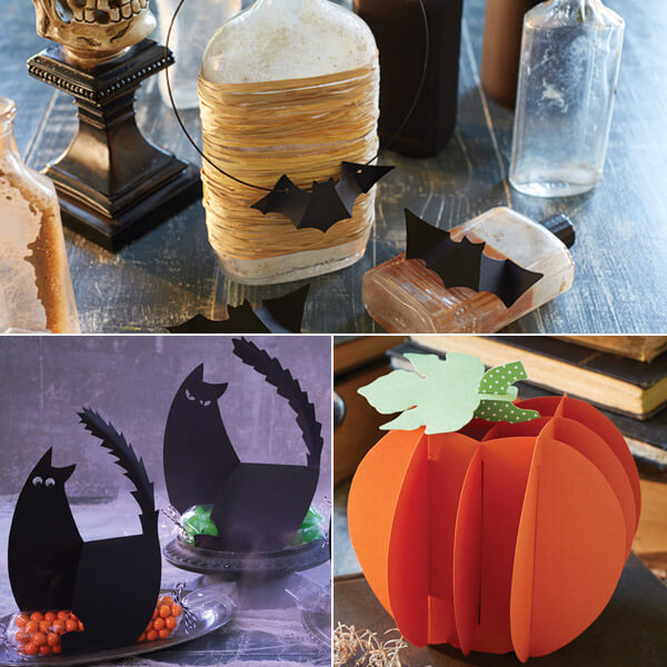 Halloween paper crafts of a bat, black cat and pumpkin.