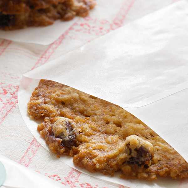 Thin and crispy oatmeal lace cookie with raisins.