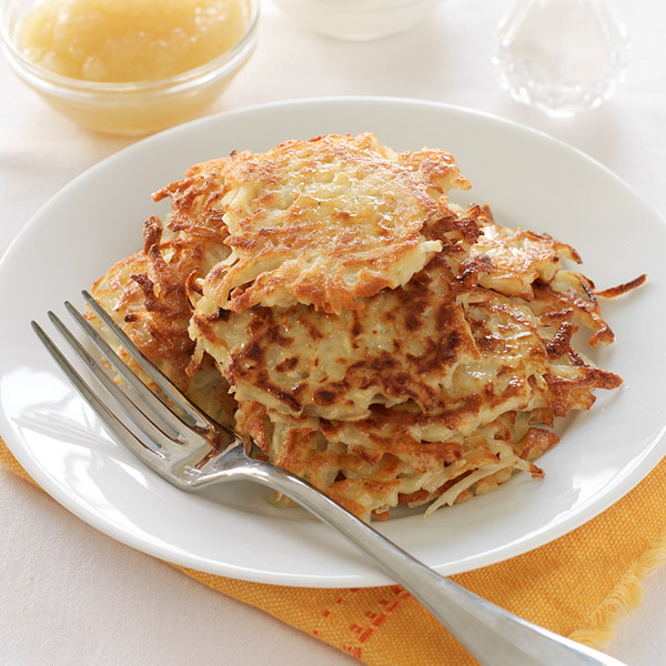 A plate of crispy potato latkes.