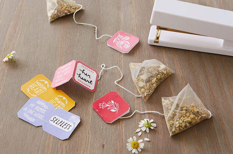 Teabags for a Mother's Day tea party on a table.