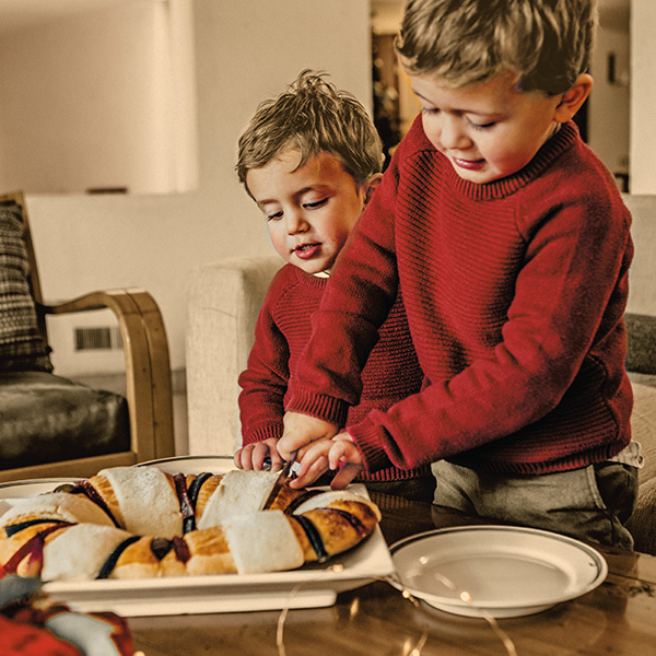 Kids with holiday food - Latinx Christmas Traditions and Holiday Celebrations