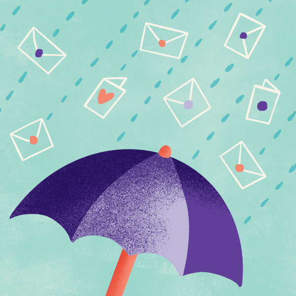 cards showering down onto umbrella like rain