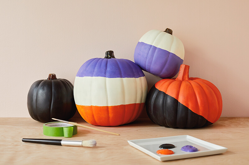 Painted pumpkins with bold color blocks