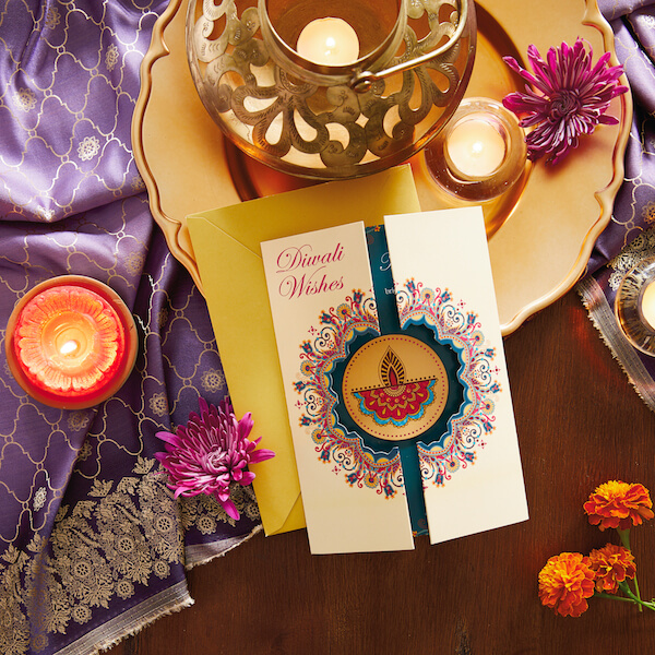 Diwali Card with candles, fabric and flowers