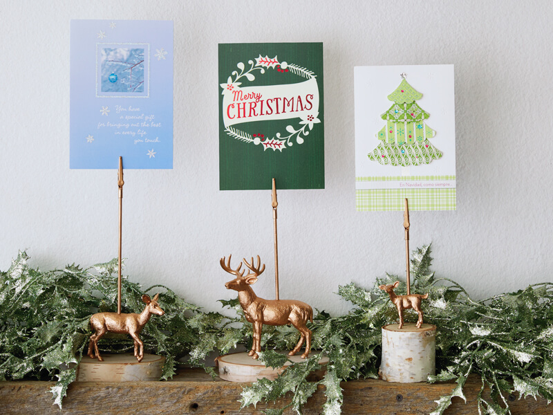 Gilded deer Christmas card holders.