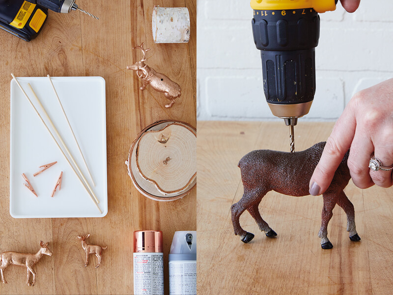 Gilded deer Christmas card holder supplies next to a drill putting a hole in a toy deer.