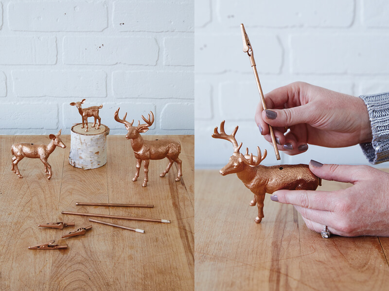 Metallic deer and fastening the card holders to the deer via the drilled hole.