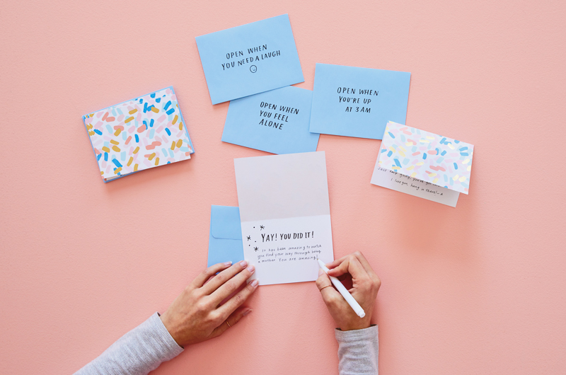 Hand writing encouraging notes for parents