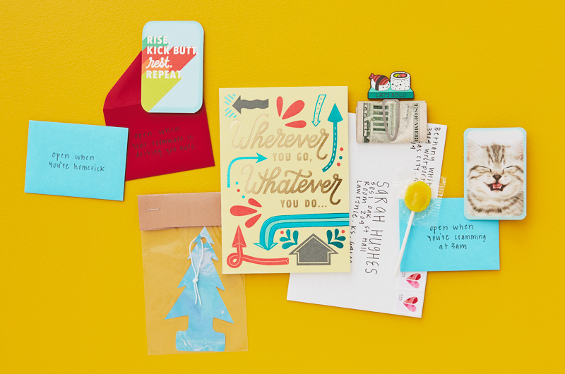 Graduations cards with little gifts on yellow background