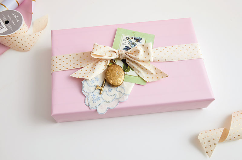 Gift with personal touch with pink wrapping paper