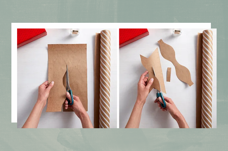 Hands cutting out wrapping paper bow template.