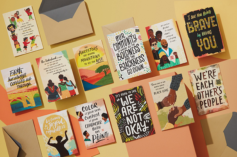A variety of Uplifted and Empowered cards on a colorful backdrop.