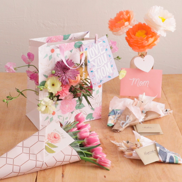 A variety of flower bouquets in different shapes and sizes, wrapped in different ways.
