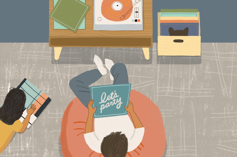 Ann illustration of a man sitting in a bean bag chair in front of a record player, his child stretched out on the carpet alongside.