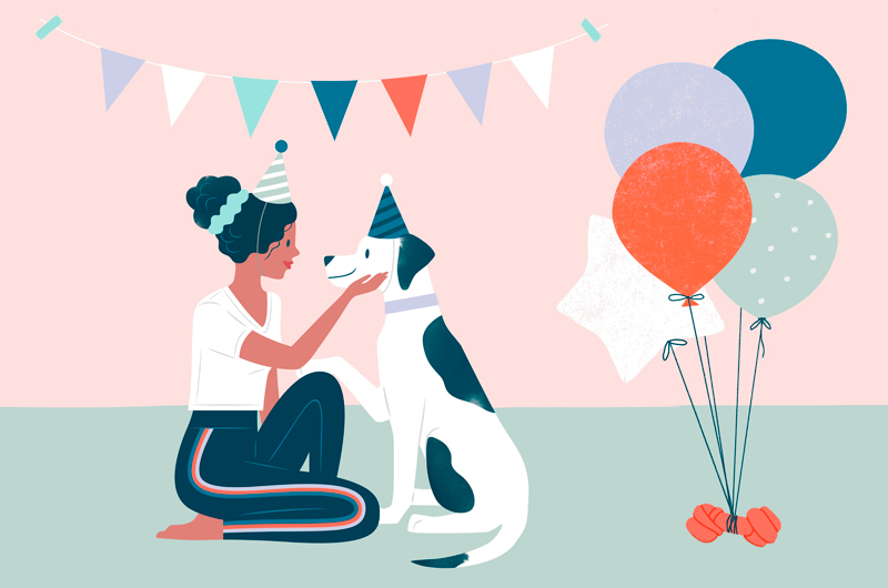 An illustration of a woman wearing a party hat and kneeling as she holds the face of her dog, who is also wearing a party hat. They are surrounded by party streamers and balloons.