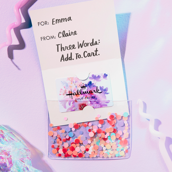 A gift card with a handwritten message on the flap that reads, 