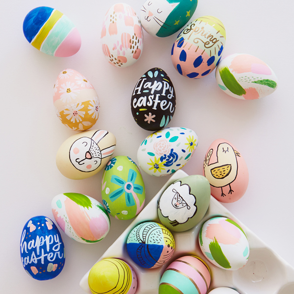Easter eggs decorated using a variety of artistic techniques like painting, drawing, lettering and more.