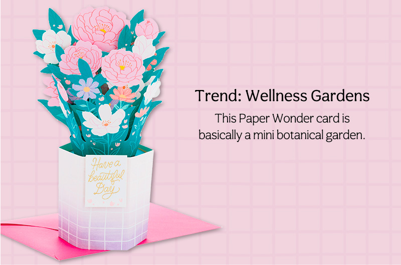 A pop-up Paper Wonder card in the shape of a bouquet of flowers bursting out of a pot, with a note that says,