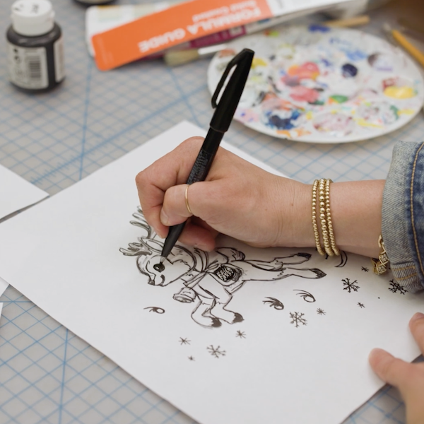 A Keepsake Artist sketches a drawing of Dasher, the first in the new Eight Tiny Reindeer Keepsake Ornament series.