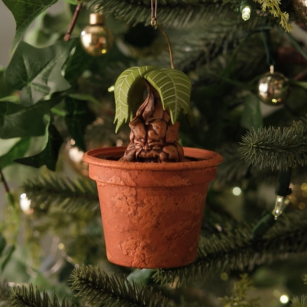A Harry Potter Keepsake Ornament featuring a Mandrake from the second movie, which screams when you pull it up out of its pot.