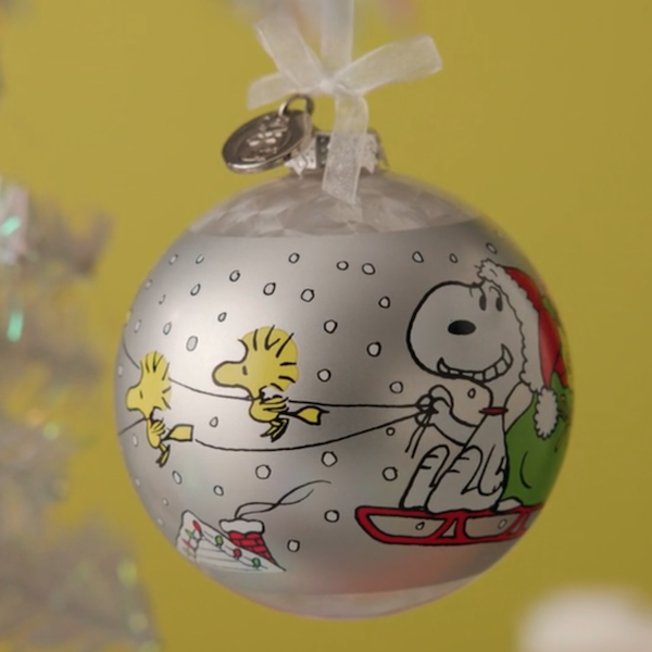 A Keepsake Ornament featuring a 75th anniversary re-release of the first Peanuts ornament sold by Hallmark.